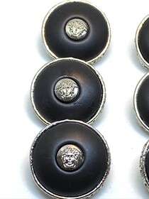 Versace Vintage Silver Medusa Head Shank Button Black background Greek Meander