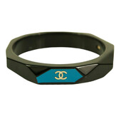 CHANEL CC Logo Bangle Bracelet In Black Resin with teal background Geometric cuff