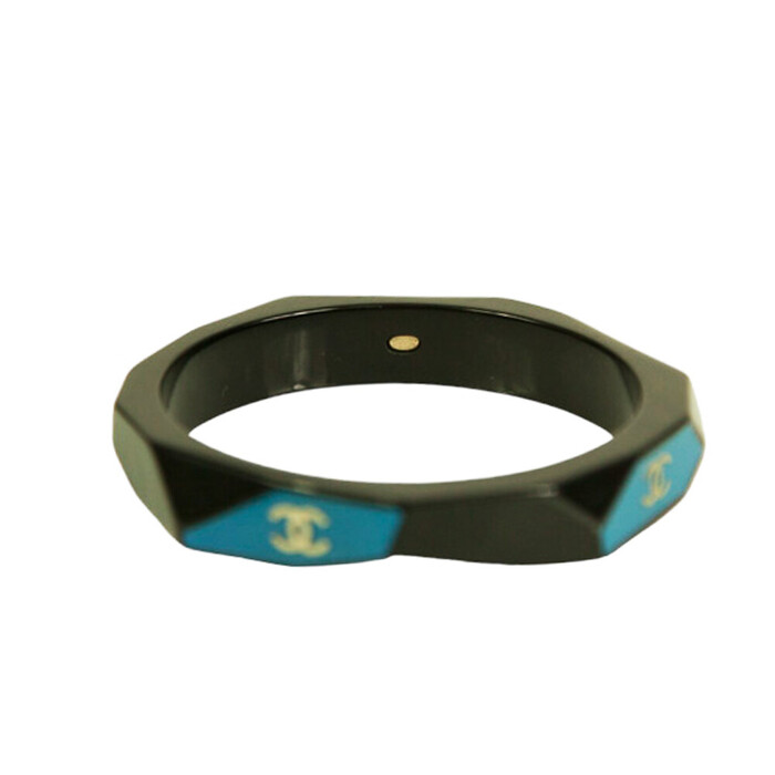CHANEL CC Logo Bangle Bracelet In Black Resin with teal background Geometric cuff