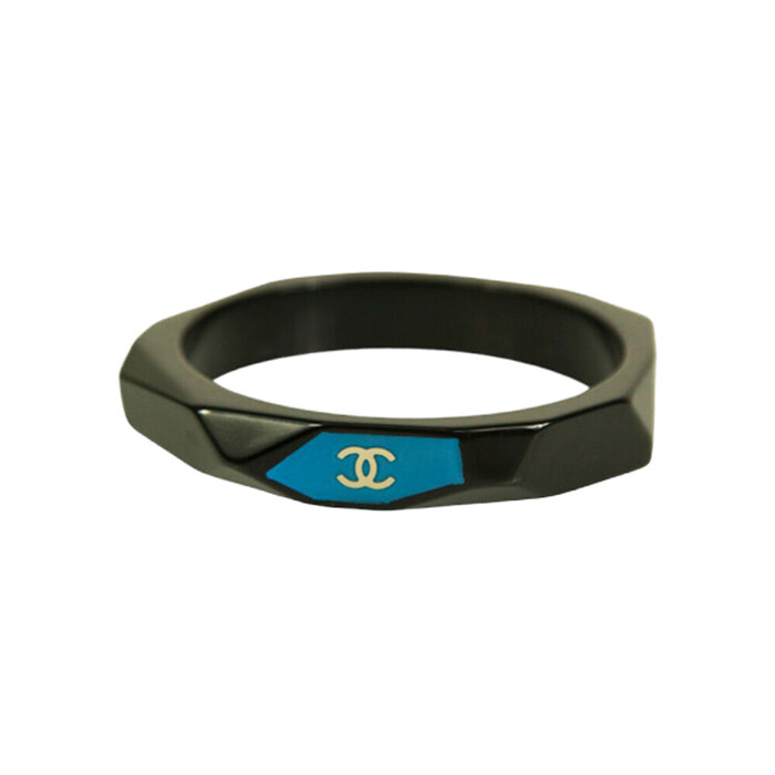 CHANEL CC Logo Bangle Bracelet In Black Resin with teal background Geometric cuff