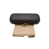 Bottega Veneta black intrecciato woven leather knot clutch bag brass tone harware