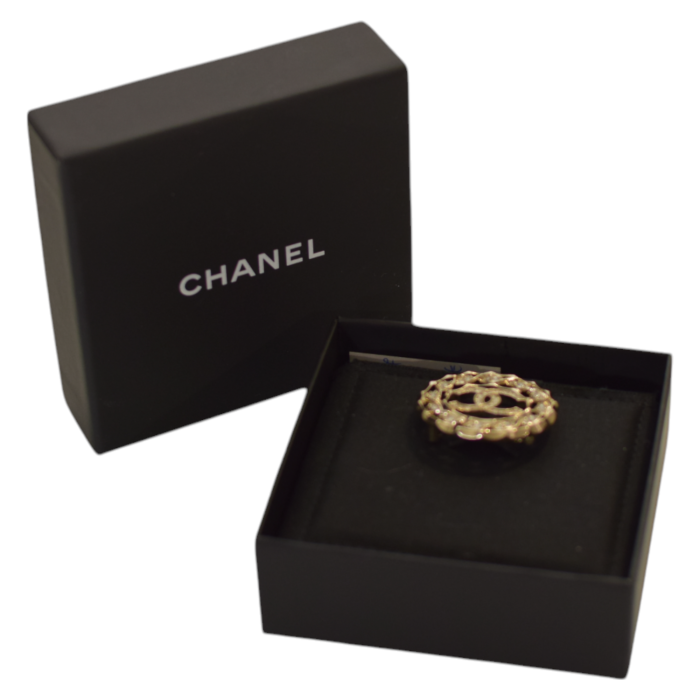 Chanel round wreath gold tone safety pin brooch with crystals