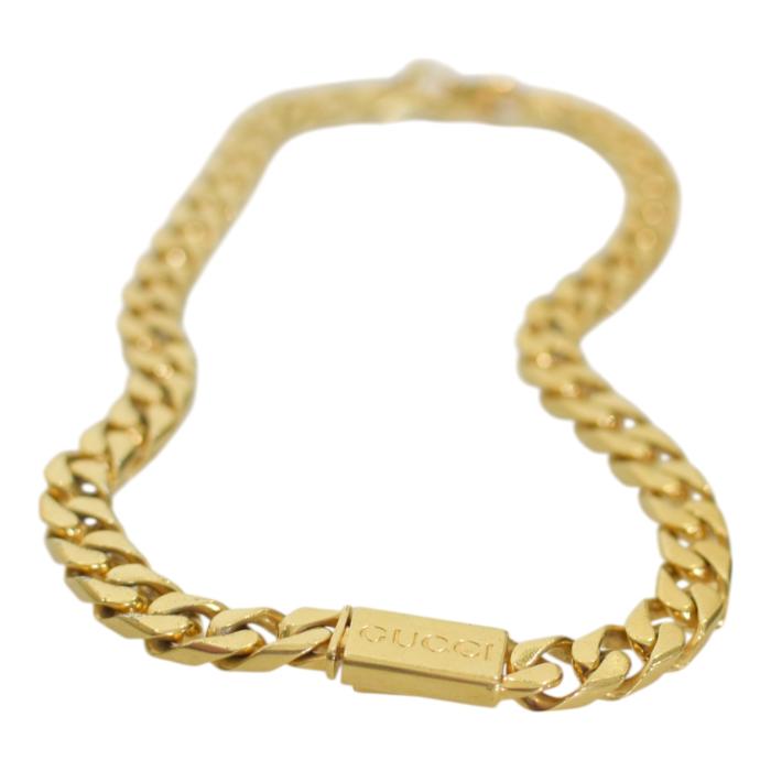 GUCCI Script logo-engraved gold-tone metal thick chain necklace retails at 850$
