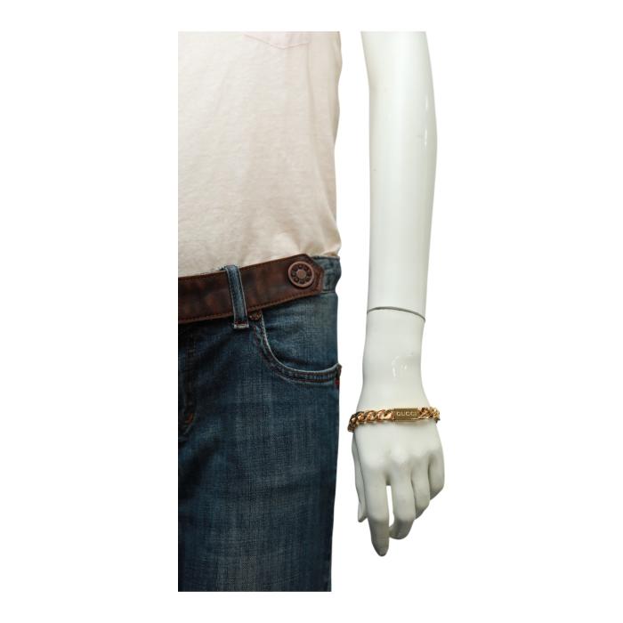 GUCCI Script logo-engraved gold-tone metal thick chain bracelet retails at 550$