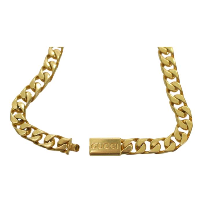 GUCCI Script logo-engraved gold-tone metal thick chain necklace retails at 850$