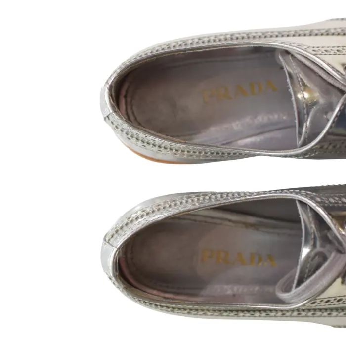 Prada Metallic Silver Brogue Leather Platform Low Top Sneakers