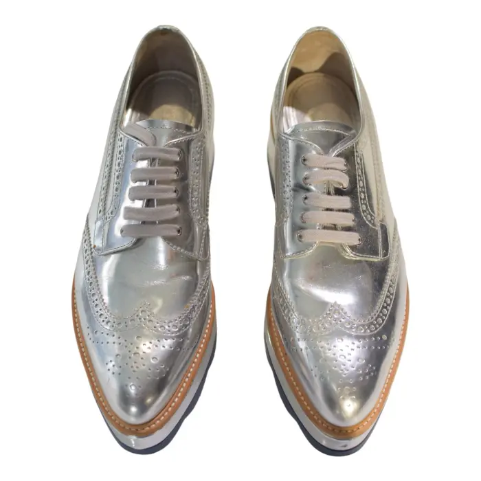 Prada Metallic Silver Brogue Leather Platform Low Top Sneakers