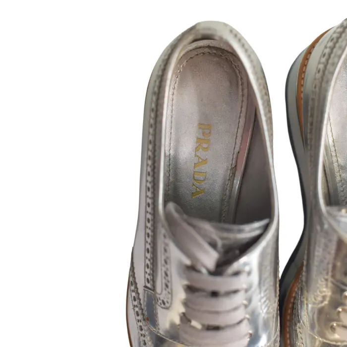 Prada Metallic Silver Brogue Leather Platform Low Top Sneakers