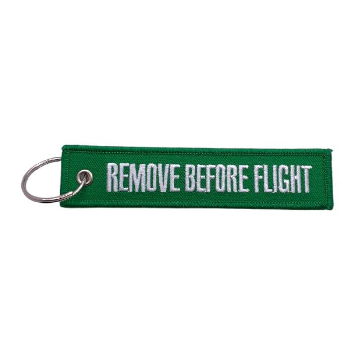 Μπρελόκ υφασμάτινο με κεντητό λογότυπο REMOVE BEFORE FLIGHT Πράσινο - Άσπρο