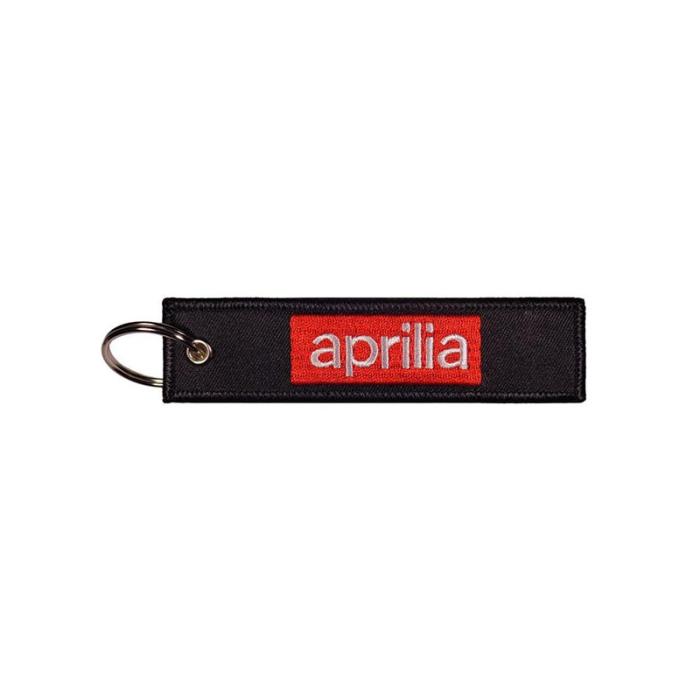 Υφασμάτινο Μπρελόκ Με Κεντητό Λογότυπο Aprilia